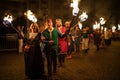 Zilina, Slovak RepubliÃÂ, Slovakia - July 28, 2023: People dressed in medieval dresses and with a flaming torches